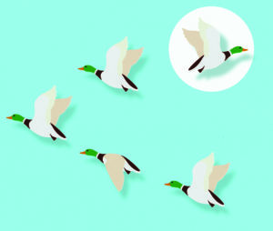 Four paper birds in flight on a turquoise background.