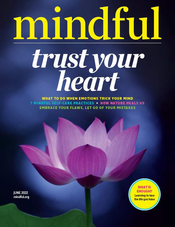 # Alt Text Magazine cover for "Mindful" featuring a glowing purple lotus flower with the headline "Trust Your Heart."
