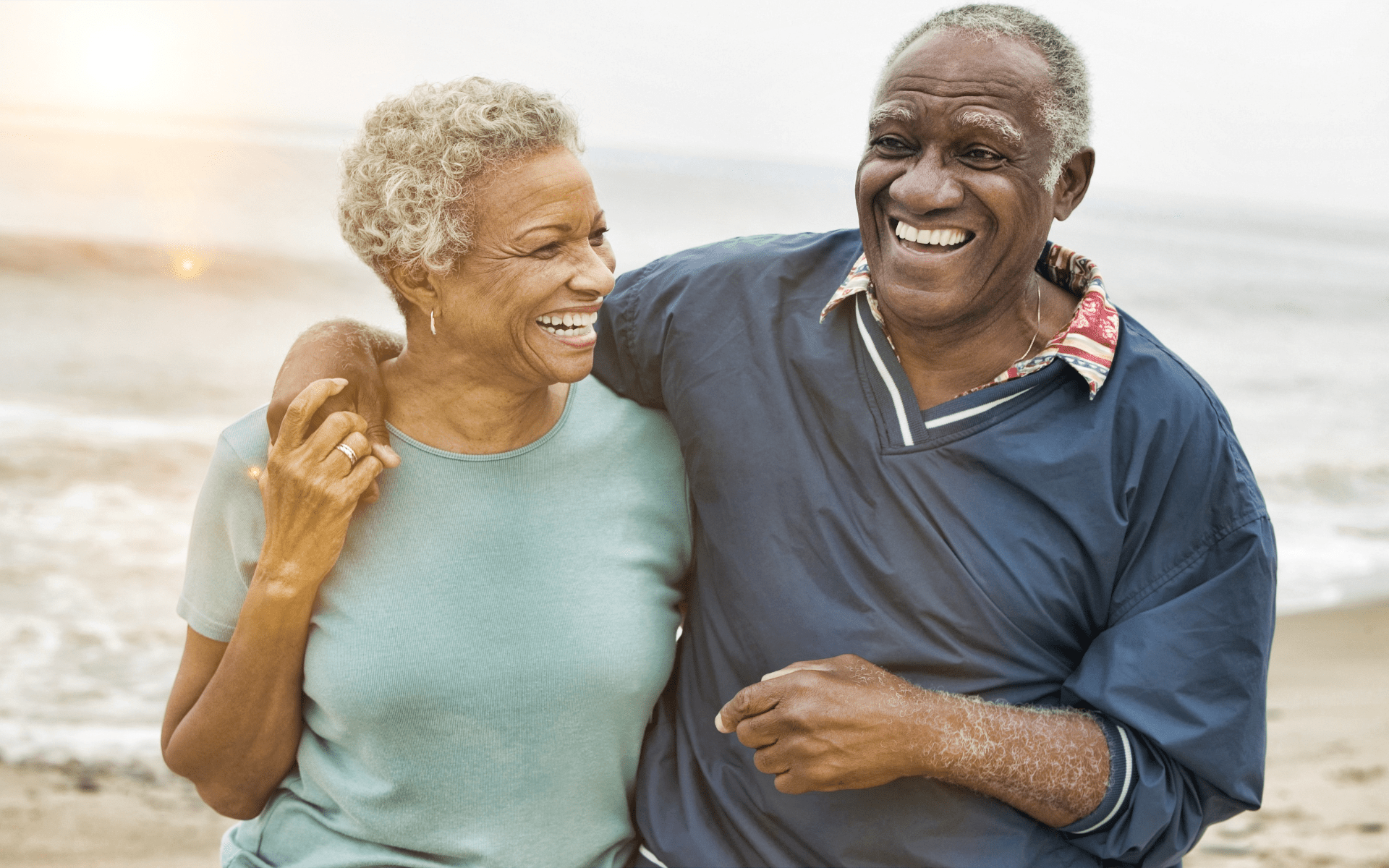 Happy Senior African American Man and Woman on the Beach
